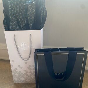 Graff gift bags and Black Ribbon  2 long strips and 2 with bow. Original